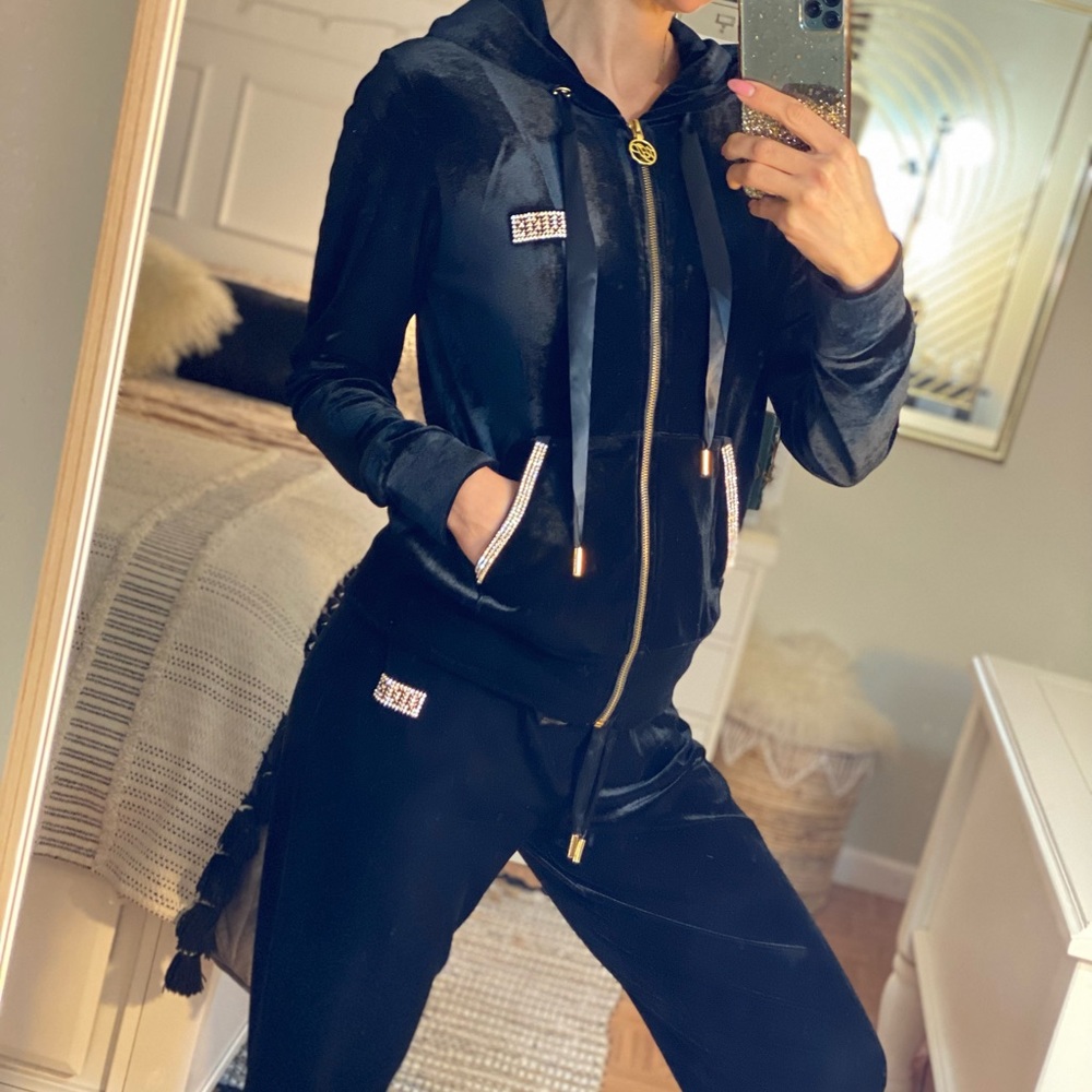 Black luxe sweatsuit. Hoodie and pants. With critical design.